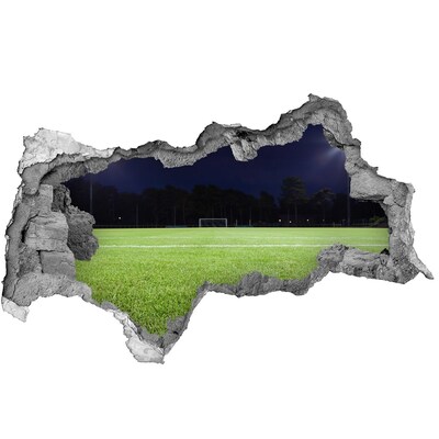 Sticker mural effet trou 3d Terrain de football la nuit