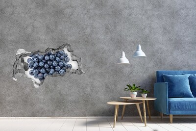 Autocollant mural trou Des myrtilles dans un trou dans le mur