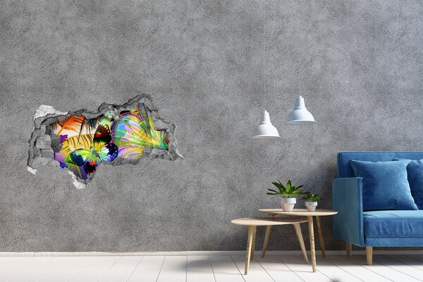 Autocollant à effet 3d trou Un papillon coloré dans un trou dans le mur