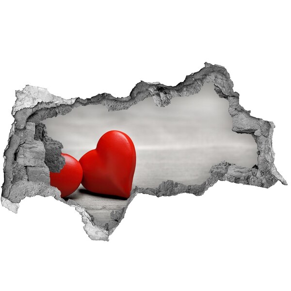 Autocollant mural trou Un cœur dans un trou dans le mur