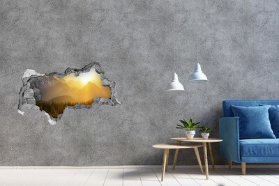 Sticker trou dans le mur Coucher de soleil en montagne béton