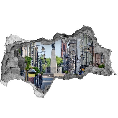 Sticker trou dans le mur Rue avec un monument