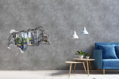 Sticker trou dans le mur Rue avec un monument