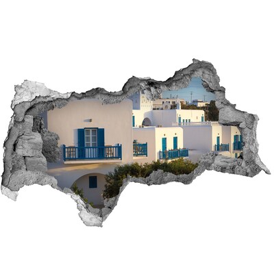 Autocollant à effet 3d trou Vue de maisons blanches aux fenêtres bleues