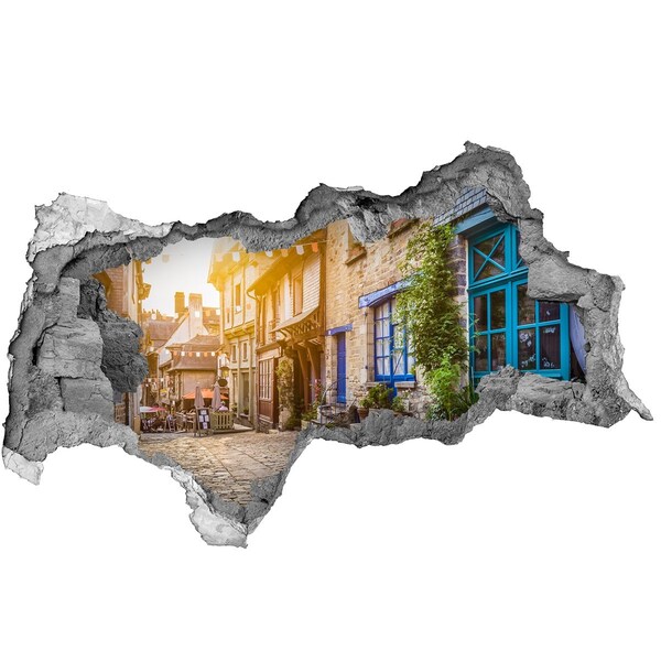 Sticker mural effet trou 3d Une rue charmante de la ville