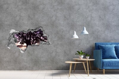 Autocollant à effet 3d trou Coucher de soleil derrière l'arbre