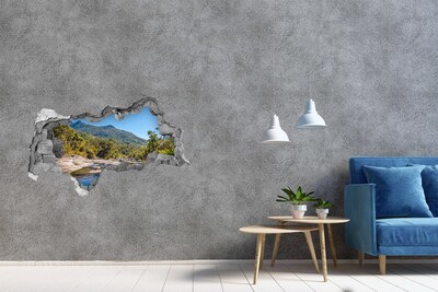 Autocollant mural trou Paysage montagneux derrière le trou dans le mur