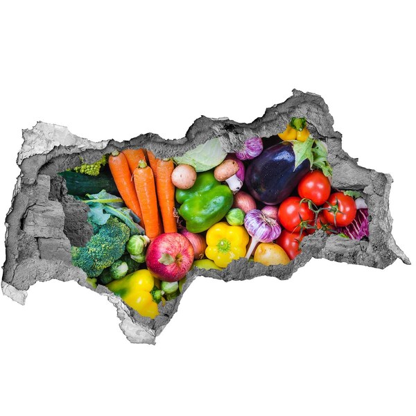 Sticker trou dans le mur Des légumes et des fruits colorés dans un trou dans le mur