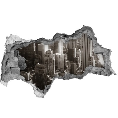 Autocollant mural trou Vue de la ville depuis un trou dans le mur