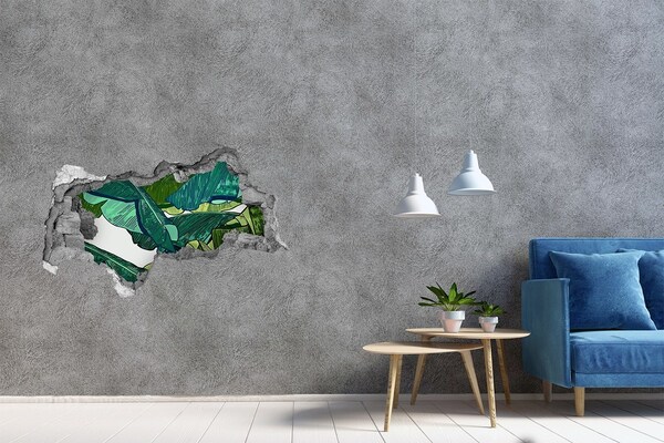 Autocollant mural trou jardin tropical avec des feuilles de bananier