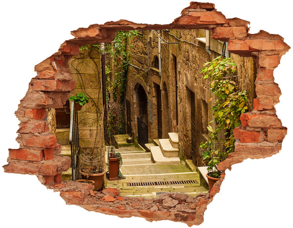 Sticker mural effet trou Une rue charmante de la ville