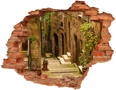 Sticker mural effet trou Une rue charmante de la ville