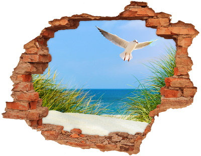 Sticker mural effet trou Seagull sur la plage brique