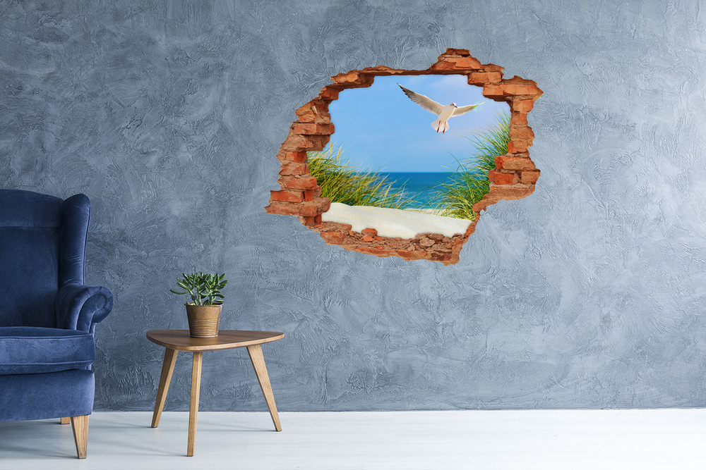 Sticker mural effet trou Seagull sur la plage brique