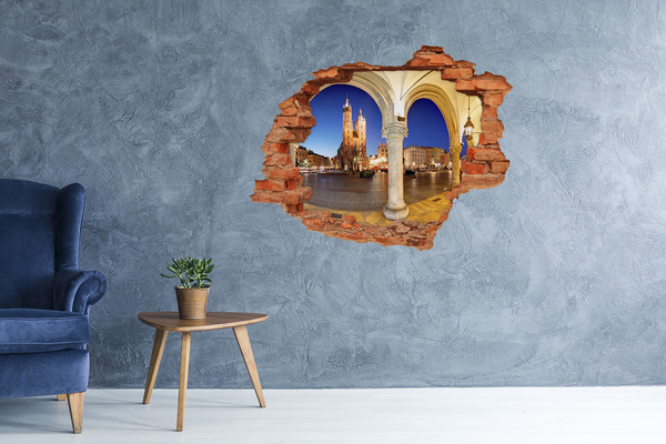 Autocollant à effet 3d trou La place du marché principal de Cracovie la nuit