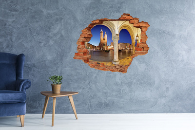 Autocollant à effet 3d trou La place du marché principal de Cracovie la nuit