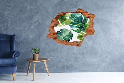 Autocollant mural trou Feuilles tropicales vertes dans un mur endommagé