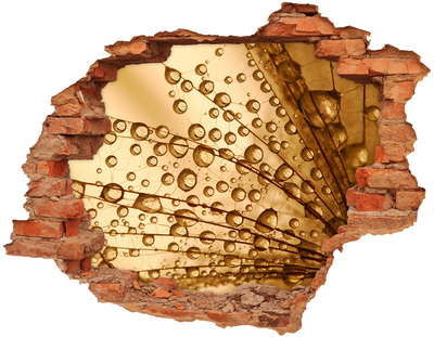 Autocollant à effet 3d trou Une goutte dorée sur fond de béton