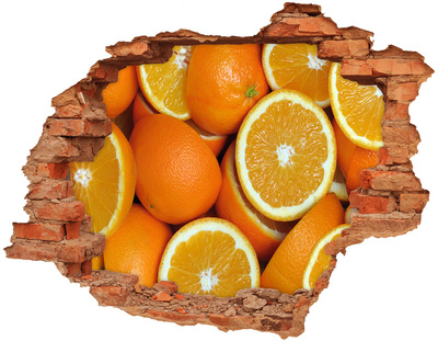 Autocollant à effet 3d trou Des oranges fraîches dans un trou dans le mur