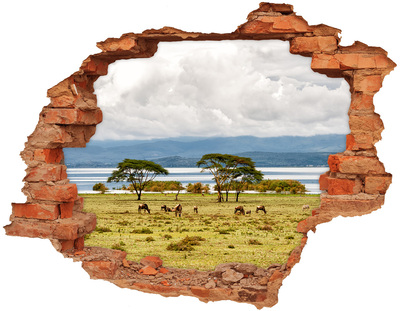 Sticker mural effet trou Paysage africain avec des animaux sauvages