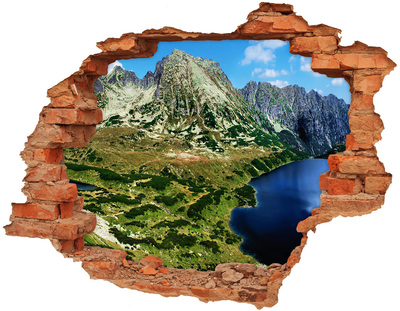 Sticker trou dans le mur Paysage montagneux avec un lac