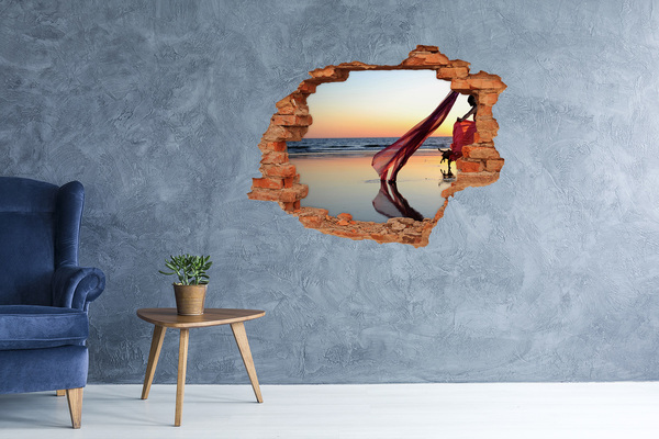 Sticker mural effet trou Danser sur la plage au coucher du soleil