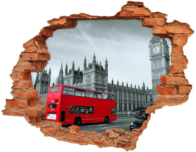Sticker trou dans le mur Paysage londonien avec un bus rouge