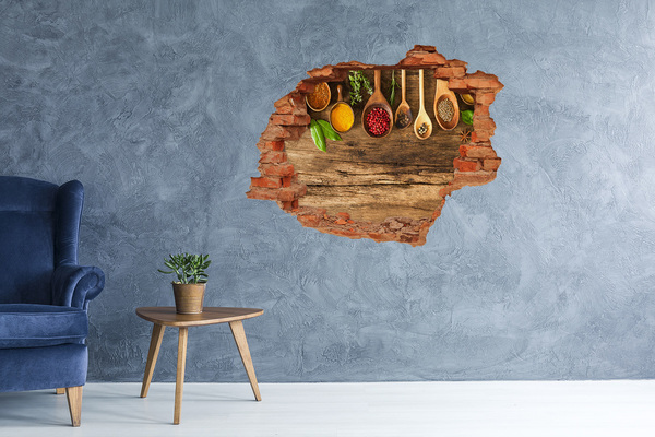 Sticker trou dans le mur Épices de cuisine sur un comptoir en bois