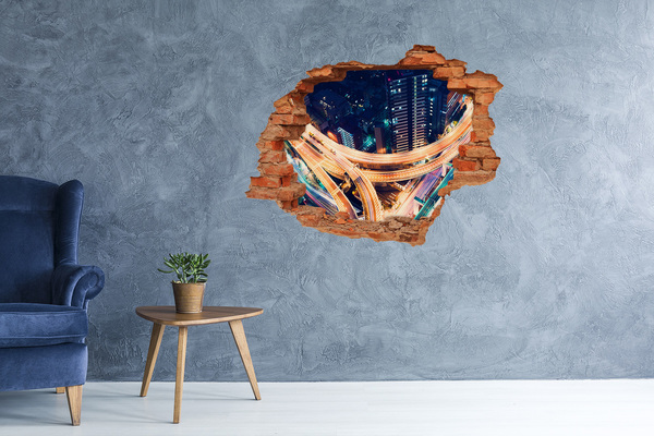 Sticker trou dans le mur Vue de la ville la nuit