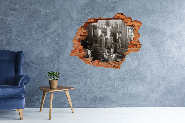 Sticker mural effet trou Vue de la ville depuis un trou dans le mur