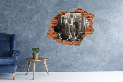 Sticker mural effet trou Vue de la ville depuis un trou dans le mur