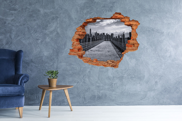 Sticker mural effet trou Vue de la ville depuis la jetée