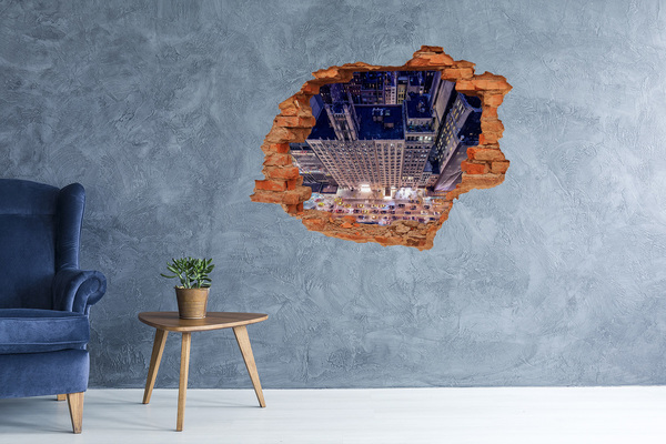 Sticker mural effet trou Vue depuis les hauteurs de la ville la nuit