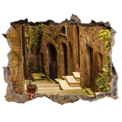 Sticker mural effet trou Une rue charmante de la ville