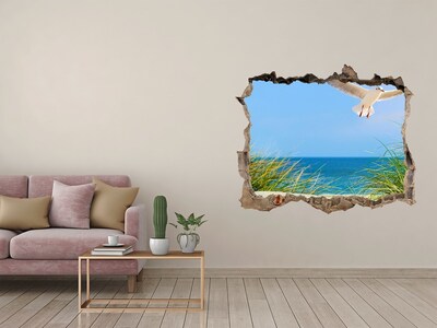 Sticker mural effet trou Seagull sur la plage pierre