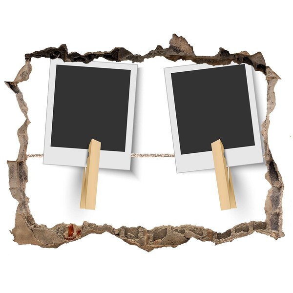 Autocollant mural trou Un mur abîmé avec des cadres photo