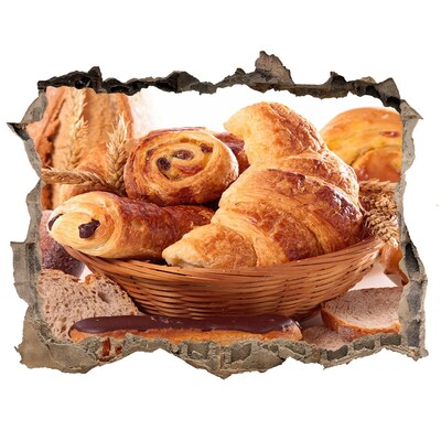 Sticker trou dans le mur De délicieuses pâtisseries dans un panier