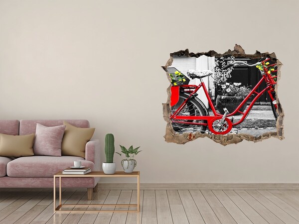 Sticker trou dans le mur Un vélo rouge dans un environnement urbain