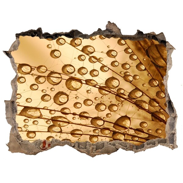 Autocollant à effet 3d trou Une goutte dorée sur fond de béton