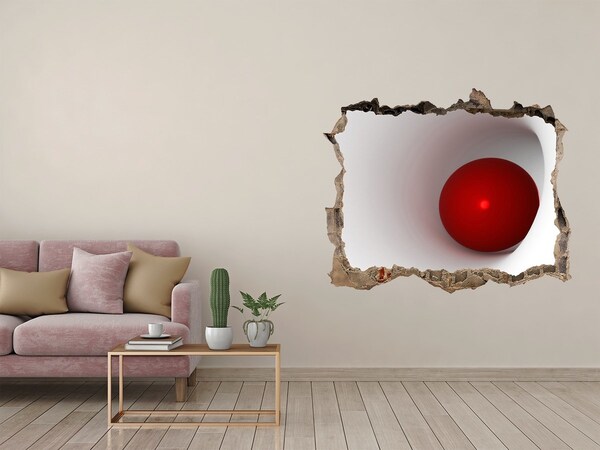 Autocollant mural trou Boule rouge dans un trou dans le mur
