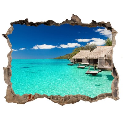 Autocollant mural trou Le lagon paradisiaque parmi les bungalows