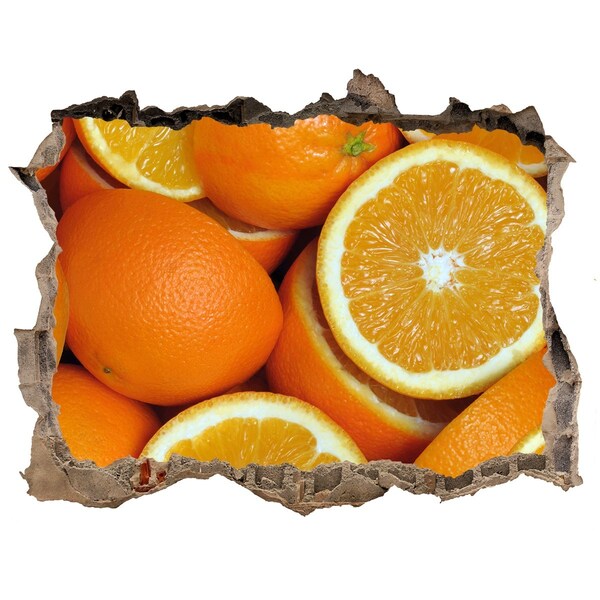 Autocollant à effet 3d trou Des oranges fraîches dans un trou dans le mur