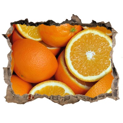 Autocollant à effet 3d trou Des oranges fraîches dans un trou dans le mur