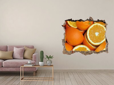 Autocollant à effet 3d trou Des oranges fraîches dans un trou dans le mur