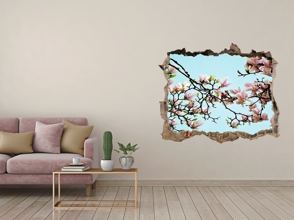 Sticker mural effet trou Des magnolias printaniers dans un ciel bleu