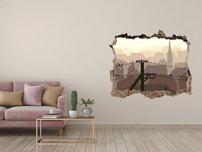 Sticker trou dans le mur Vue de la ville à travers un trou dans le mur