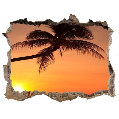 Sticker mural effet trou Coucher de soleil sur une plage tropicale