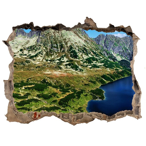 Sticker trou dans le mur Paysage montagneux avec un lac