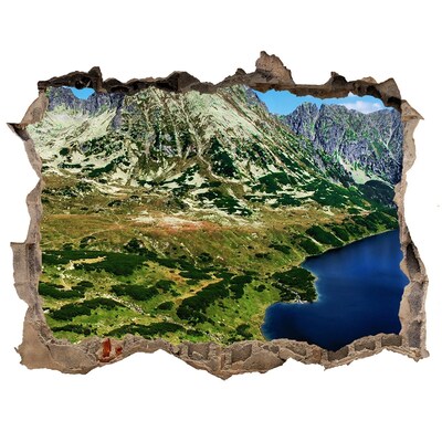 Sticker trou dans le mur Paysage montagneux avec un lac