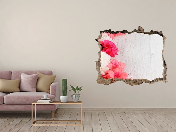 Sticker mural effet trou Une oasis florale derrière le mur